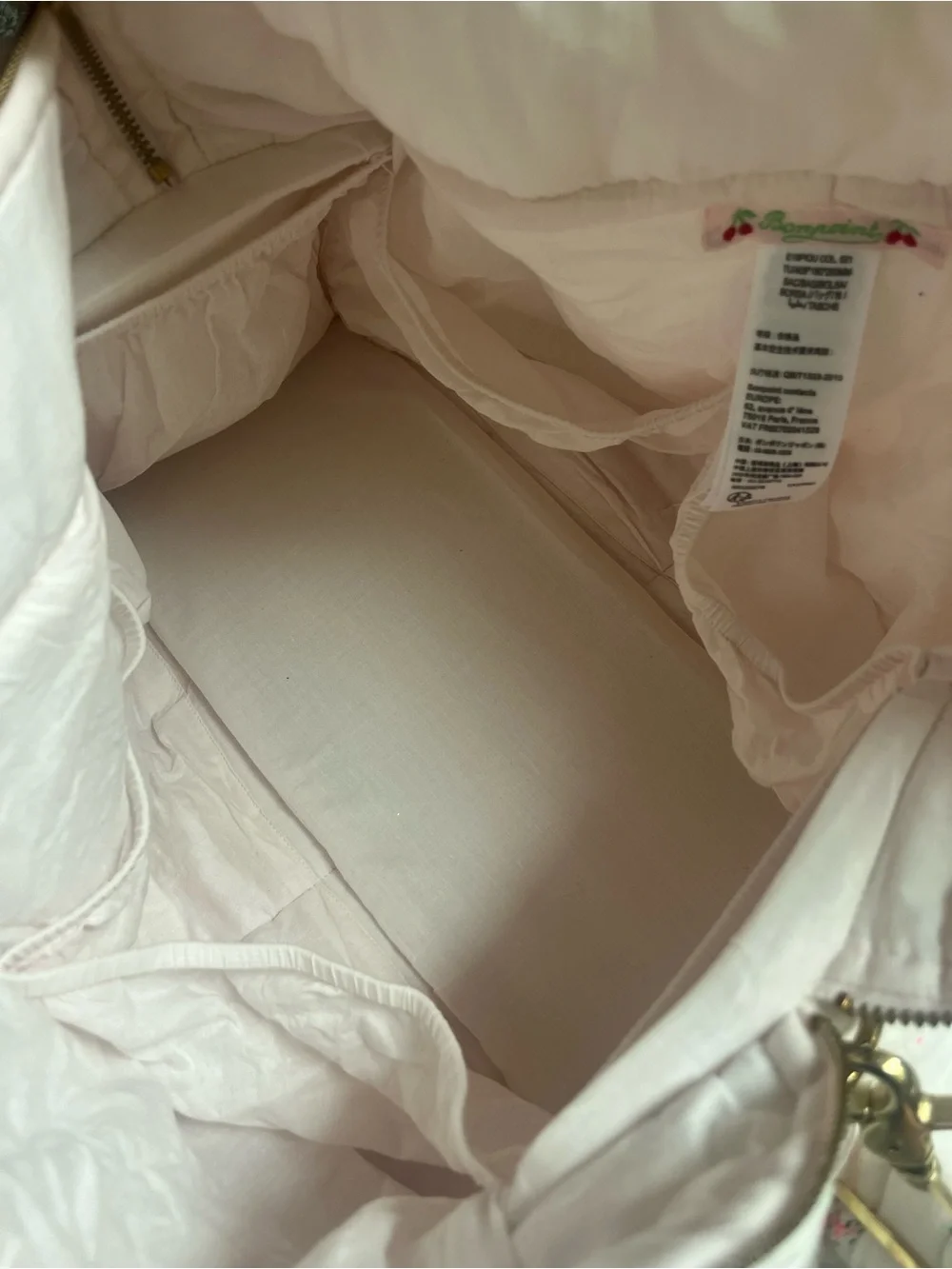 Bonpoint Quilted Floral Diaper Bag in Light Cream and Pink